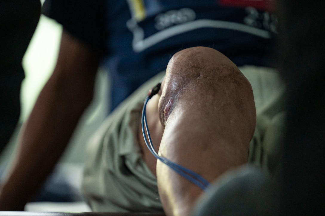 Rito Chevez’, a La Paz Honduras local, lifts his leg during a physical therapy exercise at Centro de Rehabilitacion Integral de Comayagua, Comayagua, Honduras, Sept. 17, 2025. Joint Task Force-Bravo medical providers routinely conduct local medical missions, providing an opportunity for service members to engage with the local community and improve regional stability. (U.S. Air Force photo by Staff Sgt. Sadie Colbert)