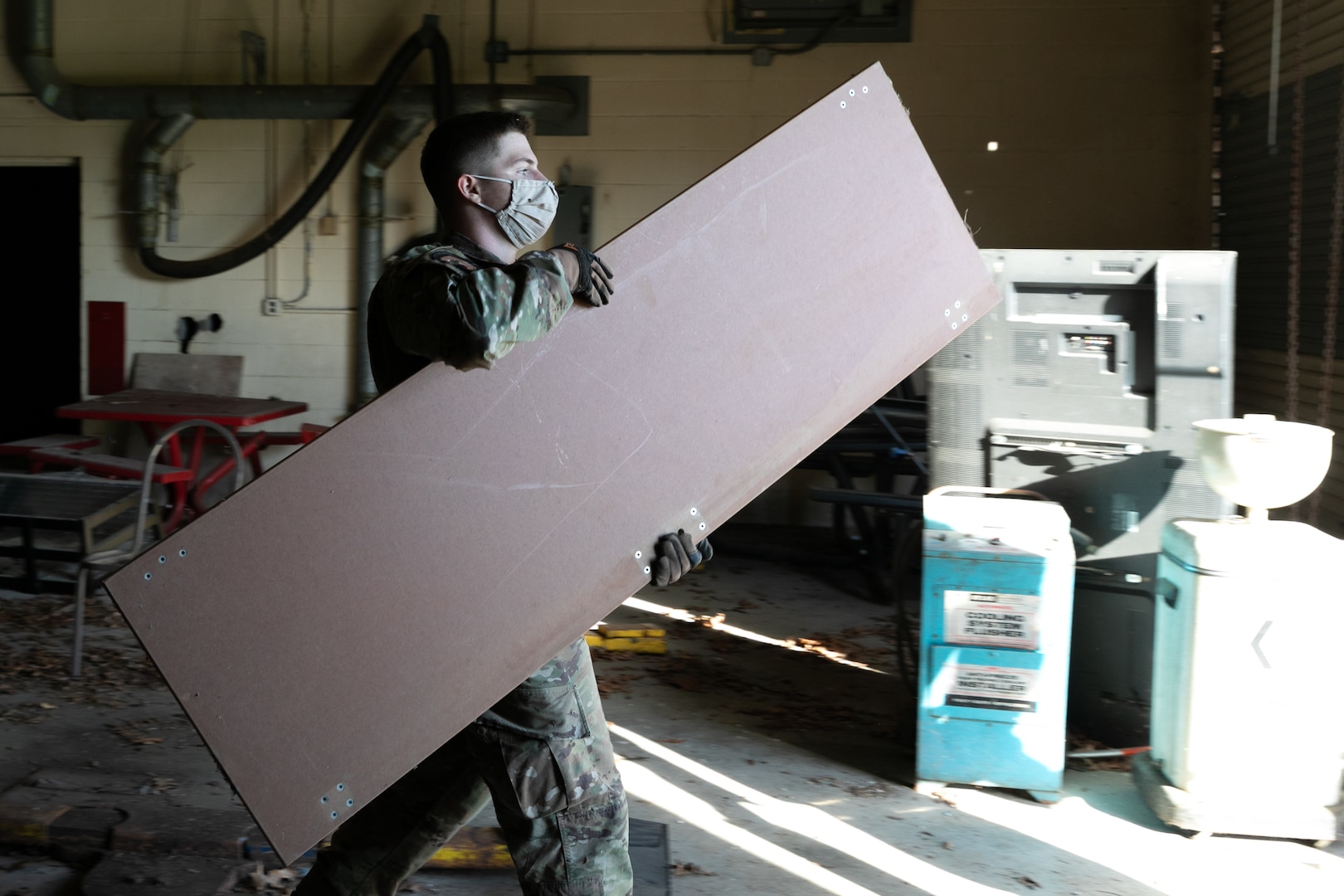 U.S. Air Force Airman 1st Class Aaron Birchfield with the District of Columbia National Guard cleans up building 12 at the Youth ChalleNGe Academy to help the facility expand and reach more youth in Laurel, Md., Oct. 1, 2025.  About 2,300 National Guard members are supporting the D.C. Safe and Beautiful mission providing critical support to the D.C. Metropolitan Police Department in ensuring the safety of all who live, work and visit the District. (U.S. Army National Guard photo by Pfc. Kylie Jorgensen)