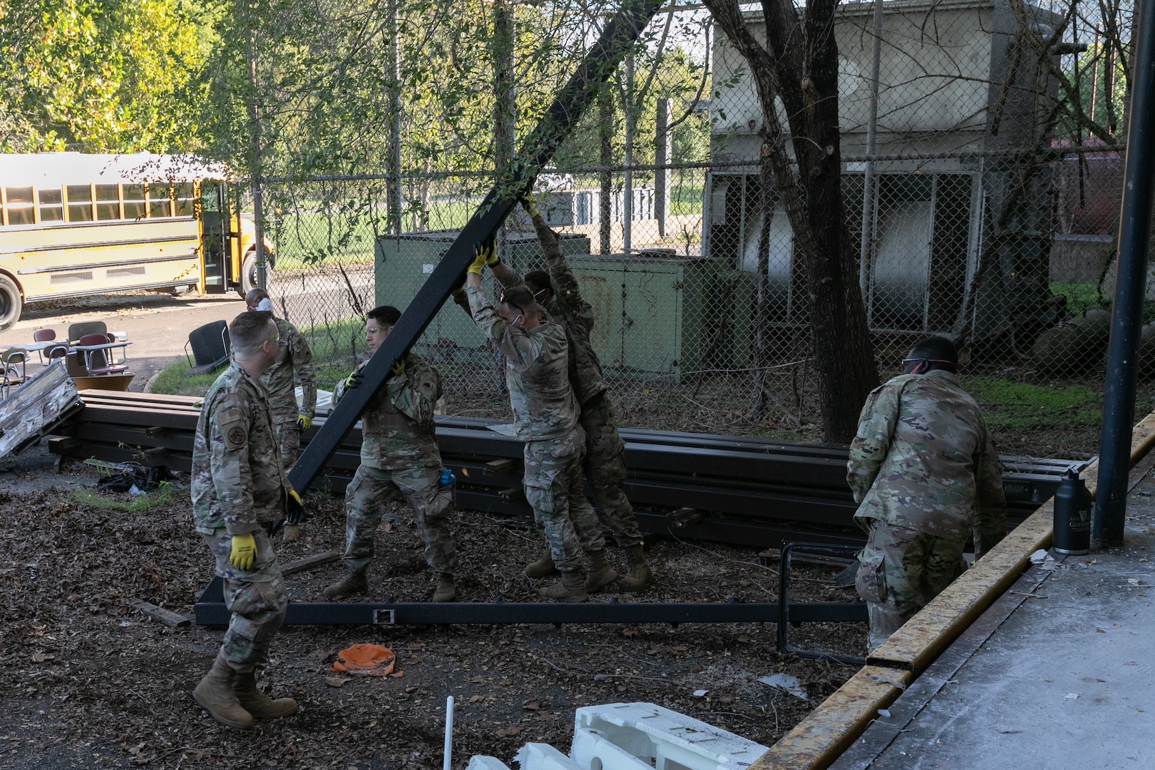 U.S. Soldiers and Airmen with the District of Columbia National Guard clean up building 12 at the Youth ChalleNGe Academy to help the facility expand and reach more youth in Laurel, Md., Oct. 1, 2025.  About 2,300 National Guard members are supporting the D.C. Safe and Beautiful mission providing critical support to the D.C. Metropolitan Police Department in ensuring the safety of all who live, work and visit the District.