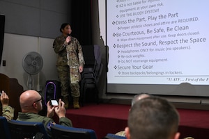 A U.S. Air Force Airman from the 11th Air Task Force briefs Airmen from the 51st Fighter Wing on facilities during exercise Ulchi Freedom Shield 25 at Daegu Air Base, Republic of Korea, Aug. 25, 2025. Airmen from both units worked together during this iterative annual exercise that strengthens the security, freedom and stability on the Korean peninsula and across Northeast Asia. (U.S. Air Force photo by Senior Airman Andrew Garavito)