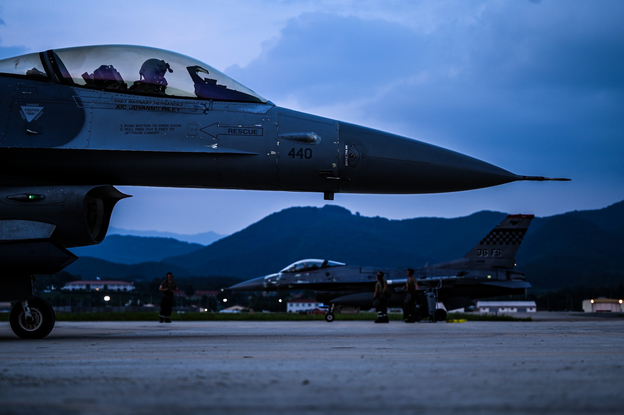 Two U.S. Air Force F-16 Fighting Falcons assigned to the 36th Fighter Squadron sit on the flightline after a hot pit refueling during exercise Ulchi Freedom Shield 25 at Daegu Air Base, Republic of Korea, Aug. 21, 2025. UFS 25 serves as a regular exercise between the ROK and the U.S., ensuring constant preparedness for military forces. (U.S. Air Force photo by Senior Airman Andrew Garavito)