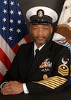 A command Master chief poses for an official photo.