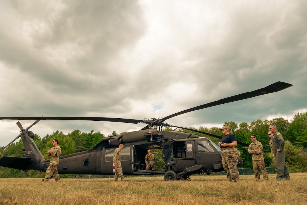 A team of Maine Army National Guardsmen address Tactical Combat Casualty Care (TCCC) students during an exercise Aug. 14, 2025, at the Bangor Air National Guard Base, Bangor, ME.