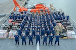 Crew members of the U.S. Coast Guard Cutter Midgett (WMSL 757) stand at parade rest on the flight deck of the cutter in San Diego, Sept. 25, 2025. The Midgett’s crew prepared to offload drugs interdicted in the Eastern Pacific during counter-narcotic patrols, eliminating 21,126 pounds of cocaine worth an estimated $156 million in value. (U.S. Coast Guard photo by Petty Officer 3rd Class Roberto A. Nieves Felix)