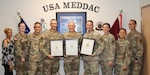 The Command Group of Ireland Army Health Clinic stand with survey completion certificates following a recent survey conducted by The Joint Commission here at Fort Knox. The survey results ranked Ireland Army Health Clinic in the top 2% of health care facilities nationwide.