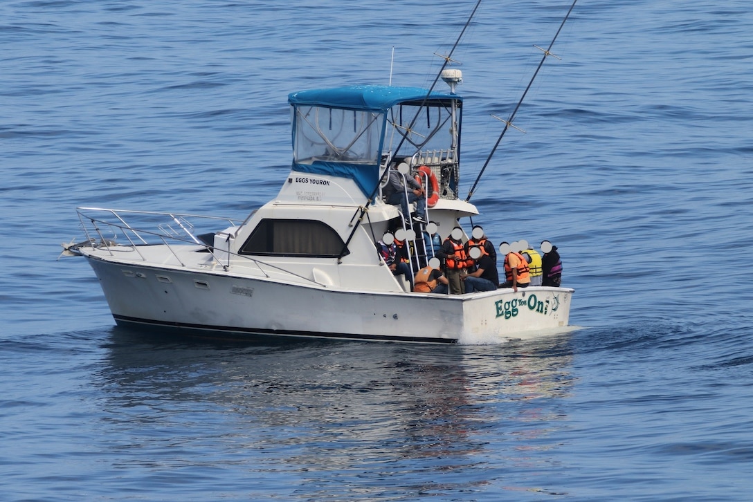 A U.S. Coast Guard Law Enforcement Detachment (LEDET) embarked aboard the Arleigh Burke-class guided-missile destroyer USS Sampson (DDG 102), interdicted 14 aliens aboard a 33-foot sport fishing  vessel approximately 18 miles southeast of Catalina Island, California, Sunday morning.