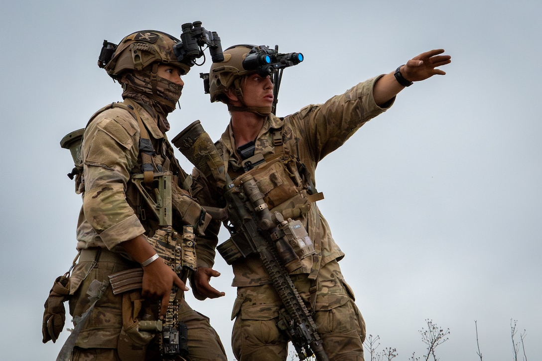 U.S. Army Soldiers assigned to 1st Battalion, 27th Infantry Regiment,  2nd Light Brigade Combat Team, 25th Infantry Division, conduct reconnaissance to gather intelligence on a target in preparation for an attack during Joint Pacific Multinational Readiness Center (JPMRC) 25-01 at Pōhakuloa Training Area, Hawaii, Oct. 11, 2024.