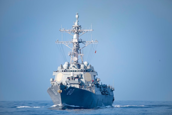 The Arleigh Burke-class guided-missile destroyer USS Roosevelt (DDG 80) as seen from the Ticonderoga-class guided missile cruiser USS Normandy (CG 60), as the ship steams into position to conduct a replenishment-at-sea, Oct. 12, 2023.
