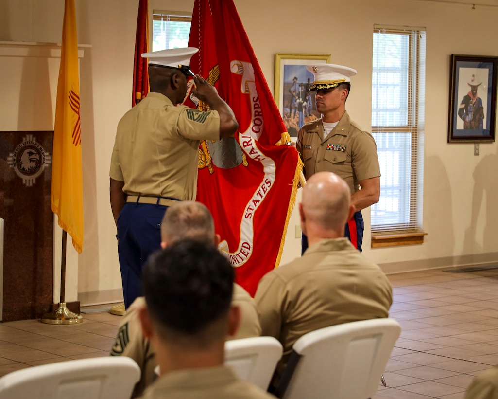 U.S. Marine Corps Maj. Christian J. Peterson, the Commanding Officer of Recruiting Station Albuquerque, 8th Marines Corps District, receives the Marine Corps colors from Sgt. Maj. Shonti J. Gregory, the Sergeant Major of Recruiting Station Albuquerque, during an assumption of command ceremony at New Mexico’s Veterans Memorial in Albuquerque, N.M.  on Aug. 28, 2025.