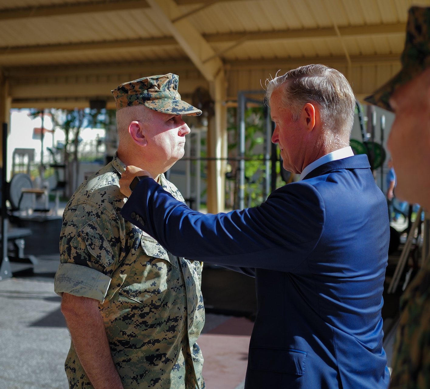 U.S. Navy Capt. Anthony L. LaCourse is promoted to rear admiral (lower half) by retired U.S. Marine Corps Lt. Gen. Carl E. Mundy III during a ceremony at MacDill Air Force Base, Fl on October 2, 2025. LaCourse became the first Navy physician assistant in history to be promoted to flag officer. (Photo by Mr. Ruben Cordero).