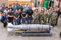 Members from the Underwater Mine Personnel Qualification Standard Working Group held at Naval Surface Warfare Center Panama City Division represent a dynamic team of experts, including engineers, logisticians, and fleet personnel involved with the Quickstrike Extended Range Program. These collaborators are working together to significantly advance the future of Naval aerial mining capabilities.