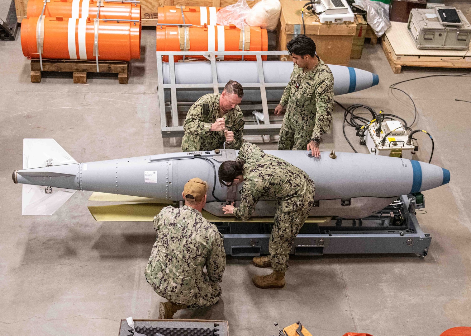 Sailors receive training on securing a wing kit on a Quickstrike Extended Range mine as part of Underwater Mine Personnel Qualification Standard Working Group held at Naval Surface Warfare Center Panama City Division, in the summer of 2025. Once deployed from the platform, the wings pop-out and provide significant extended range versus traditional air-drop mines upgrading its precision and efficacy.
