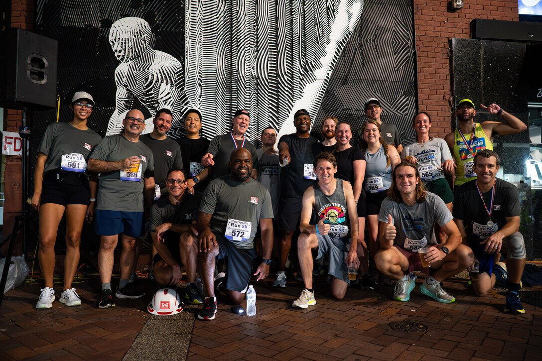 Runners pose for a photo post run