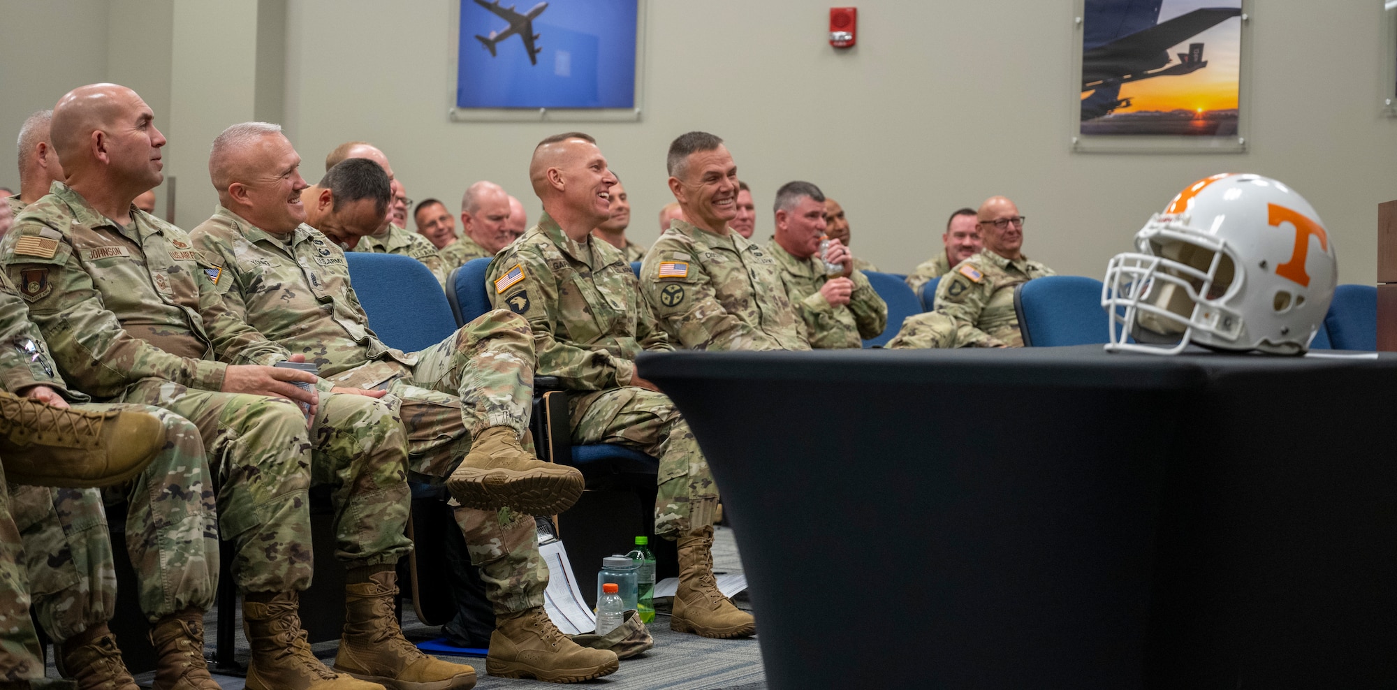Attendees of the Tennessee Senior Enlisted Leader Conference react to a joke from former University of Tennessee Knoxville Athletic Director Phillip Fulmer during his speech at McGhee Tyson Air National Guard Base September 17, 2025.