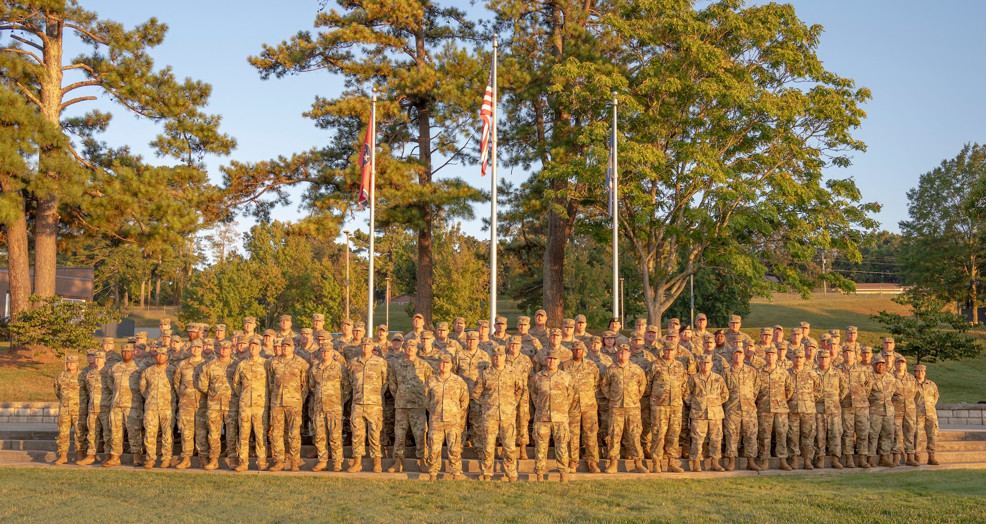 Attendees of the Tennessee Senior Enlisted Leader Conference pose for a group photo at dawn at McGhee Tyson Air National Guard Base September 18, 2025.