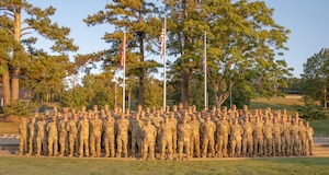 Attendees of the Tennessee Senior Enlisted Leader Conference pose for a group photo at dawn at McGhee Tyson Air National Guard Base September 18, 2025.