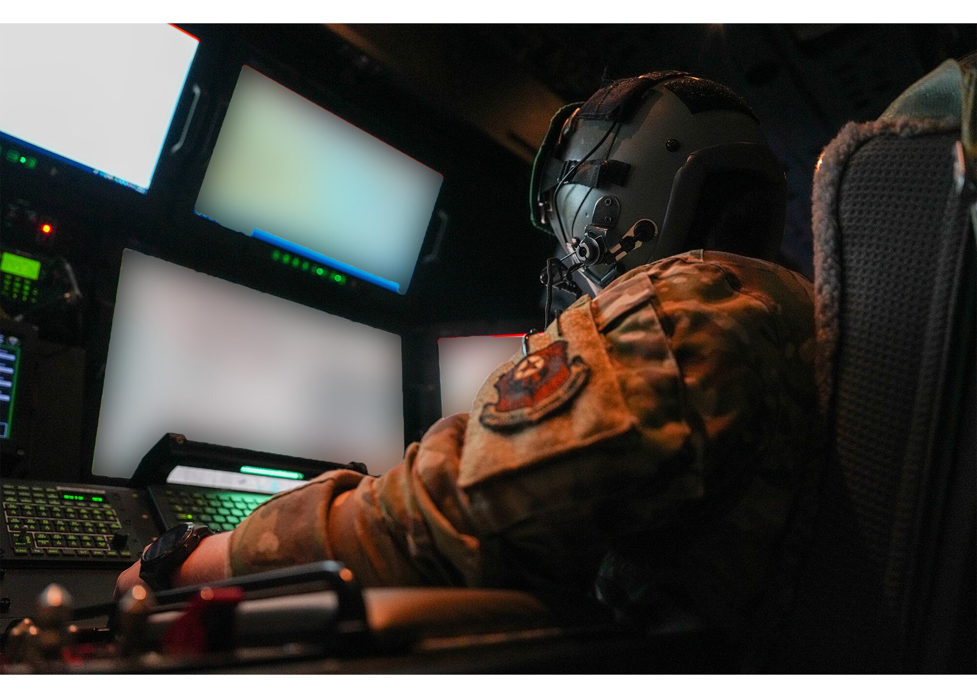 A U.S. Air Force Air Commando assigned to the 27th Special Operations Wing controls sensors on an AC-130J Ghostrider gunship during a live-fire training event over a live-fire range in Australia during exercise Talisman Sabre 2025, July 11, 2025. Held across multiple regions in Australia and Papua New Guinea, TS25 is designed to enhance multinational coordination in responding to regional crises and foster peace, stability, and prosperity in the Indo-Pacific. (U.S. Air Force photo by Airman 1st Class Gracelyn Hess)