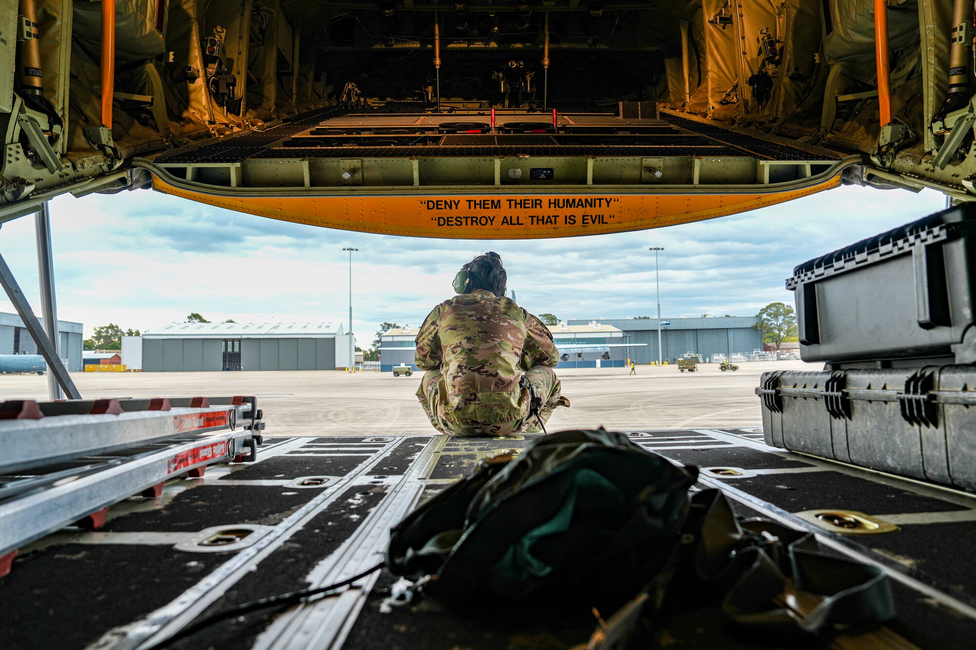 A U.S. Air Force Air Commando assigned to the 27th Special Operations Wing prepares for takeoff in an AC-130J Ghostrider gunship for a flight during exercise Talisman Sabre 2025, July 7, 2025, in New South Wales, Australia. Held across multiple regions in Australia and Papua New Guinea, TS25 is designed to enhance multinational coordination in responding to regional crises and foster peace, stability, and prosperity in the Indo-Pacific. (U.S. Air Force photo by Airman 1st Class Gracelyn Hess)