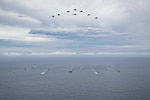 PHILIPPINE SEA (Oct. 20, 2025) - Japan Maritime Self-Defense Force, U.S. Navy and U.S. Marine Corps forces with Royal Australian Navy, Royal Canadian Navy, and French Navy sail and fly together in the Philippine Sea, Oct. 20, 2025 in support of Annual Exercise (ANNUALEX) 25. ANNUALEX is a multilateral exercise that enhances the Japan and U.S. alliance, strengthens naval interoperability and demonstrates a joint commitment to a free and open Indo-Pacific. (U.S. Navy photo by Petty Officer 1st Class R. Ezekiel Duran)