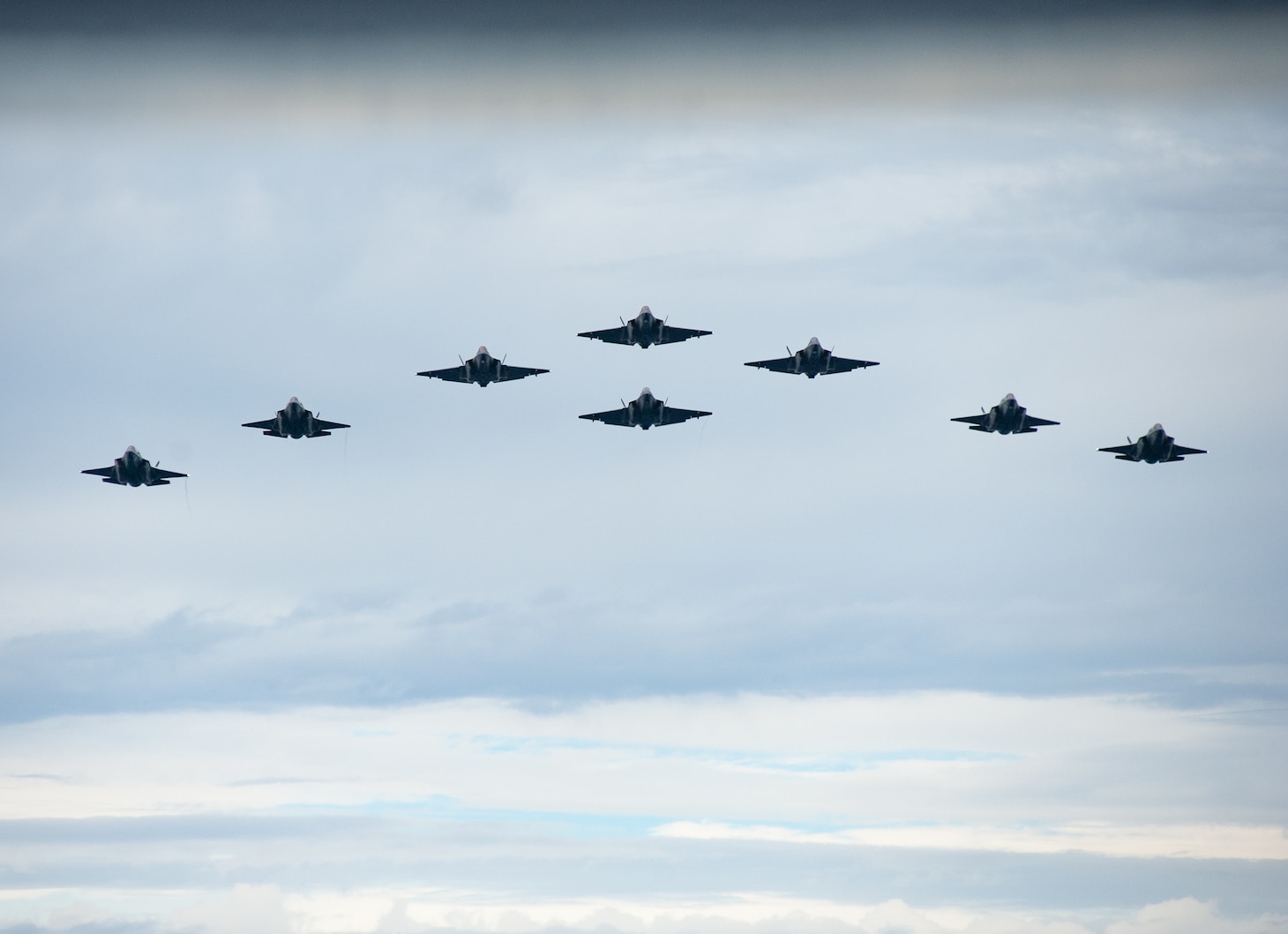 PHILIPPINE SEA (Oct. 20, 2025) - U.S. Marine Corps F-35B Lightning II assigned to Marine Fighter Attack Squadron (VMFA) 242 and U.S. Navy F-35C Lightning II assigned to Strike Fighter Squadron (VFA) 147 fly in formation in the Philippine Sea, Oct. 20, 2025 in support of Annual Exercise (ANNUALEX) 25. ANNUALEX is a multilateral exercise that enhances the Japan and U.S. alliance, strengthens naval interoperability and demonstrates a joint commitment to a free and open Indo-Pacific. (U.S. Navy photo by Petty Officer 1st Class R. Ezekiel Duran)