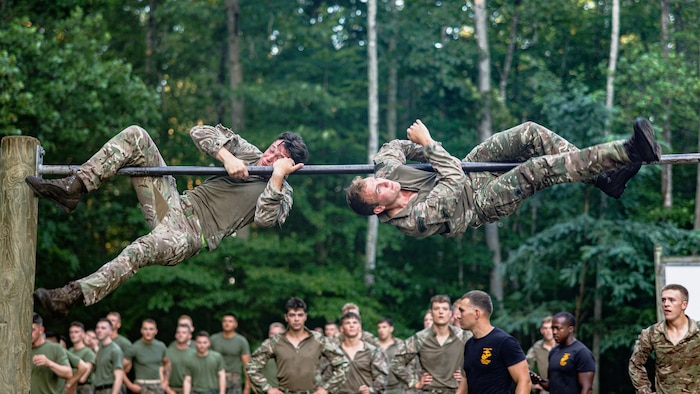 British Royal Marines conduct the obstacle course as part of “Virginia Tempest” at The Basic School on Marine Corps Base Quantico, Virginia, July 28, 2025. Virginia Tempest is an annual training event where Royal Marines and U.S. Marines collaborate in training such as the obstacle course, Marine Corps Martial Arts Program, and other rigorous events, ultimately designed to support interoperability and maintaining the historic working relationship between the organizations. (U.S. Marine Corps photo by Lance Cpl. Braydon Rogers)