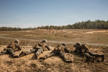 U.S. Marine Corps students with Company D, Basic Officer Course 4-25, The Basic School, provide support-by-fire during a live-fire Field Firing Exercise on Marine Corps Base Quantico, Virginia, Oct. 10, 2025. The FFEX provided students the opportunity to refine their skills in conducting a live-fire assault on a target with support-by-fire and maneuver elements. (U.S. Marine Corps photo by Cpl. Joshua Barker)