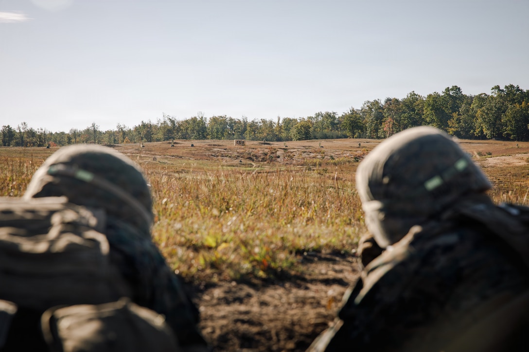 U.S. Marine Corps students with Company D, Basic Officer Course 4-25, The Basic School, provide support-by-fire during a dry-fire run of a Field Firing Exercise on Marine Corps Base Quantico, Virginia, Oct. 10, 2025. The FFEX provided students the opportunity to refine their skills in conducting a live-fire assault on a target with support-by-fire and maneuver elements. (U.S. Marine Corps photo by Cpl. Joshua Barker)