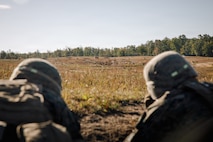 U.S. Marine Corps students with Company D, Basic Officer Course 4-25, The Basic School, provide support-by-fire during a dry-fire run of a Field Firing Exercise on Marine Corps Base Quantico, Virginia, Oct. 10, 2025. The FFEX provided students the opportunity to refine their skills in conducting a live-fire assault on a target with support-by-fire and maneuver elements. (U.S. Marine Corps photo by Cpl. Joshua Barker)