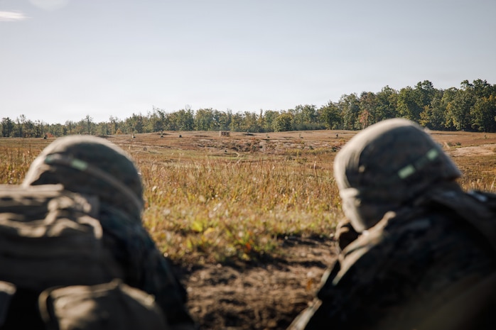 U.S. Marine Corps students with Company D, Basic Officer Course 4-25, The Basic School, provide support-by-fire during a dry-fire run of a Field Firing Exercise on Marine Corps Base Quantico, Virginia, Oct. 10, 2025. The FFEX provided students the opportunity to refine their skills in conducting a live-fire assault on a target with support-by-fire and maneuver elements. (U.S. Marine Corps photo by Cpl. Joshua Barker)