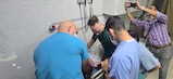 medical staff give medical attention to a patient.