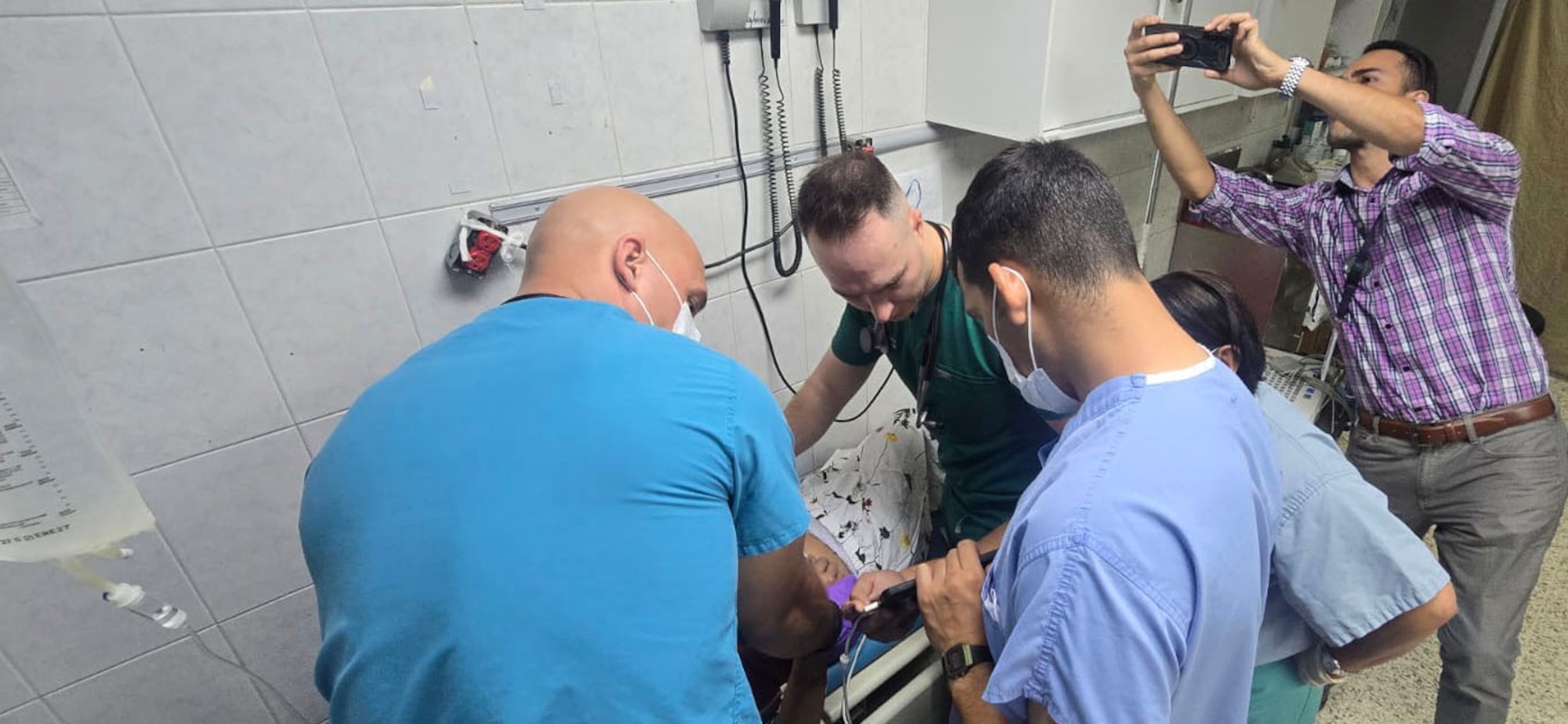 medical staff give medical attention to a patient.