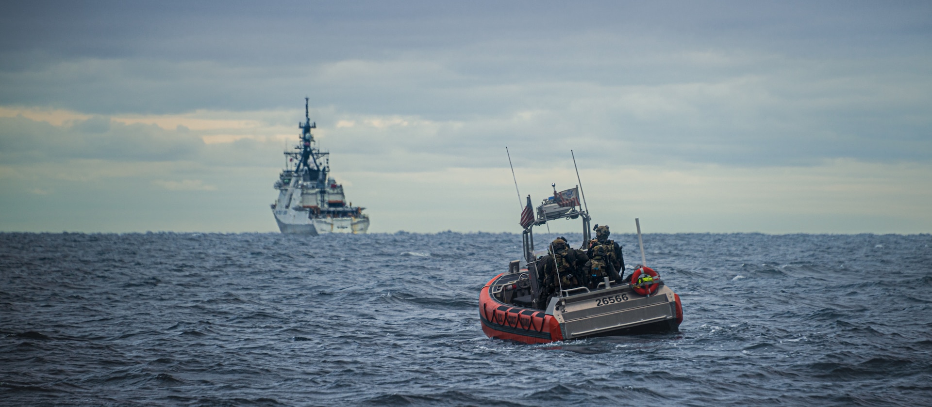 Members of Coast Guard Maritime Security Response Team West, USCGC Waesche (751), and Special Operations Forces transit on an Over the Horizon cutter boat during Arctic Edge 2025 near Nome, Alaska, Aug. 10, 2025. AE25 is a North American Aerospace Defense Command (NORAD) and U.S. Northern Command-led homeland defense exercise designed to improve readiness, demonstrate capabilities, and enhance Joint and Allied Force interoperability in the Arctic. (U.S. Coast Guard photo by Petty Officer 3rd Class Cameron Snell)