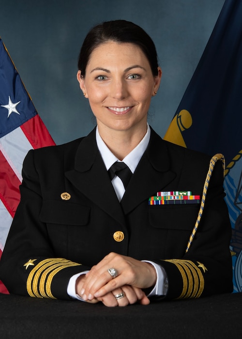 An official portrait of Capt. Gina Becker, chief of staff, Naval Service Training Command.