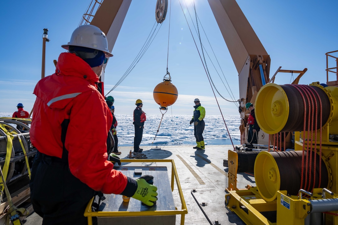 A team aboard the U.S. Coast Guard Cutter Healy (WAGB 20) bring aboard an Arctic Mobile Observing Systems (AMOS) mooring while operating in the Arctic Ocean, July 21, 2025. The AMOS moorings were deployed in previous years and have been collecting data on the Arctic Ocean’s oceanography since. (U.S. Coast Guard Photo by Petty Officer 3rd Class Chris Sappey)