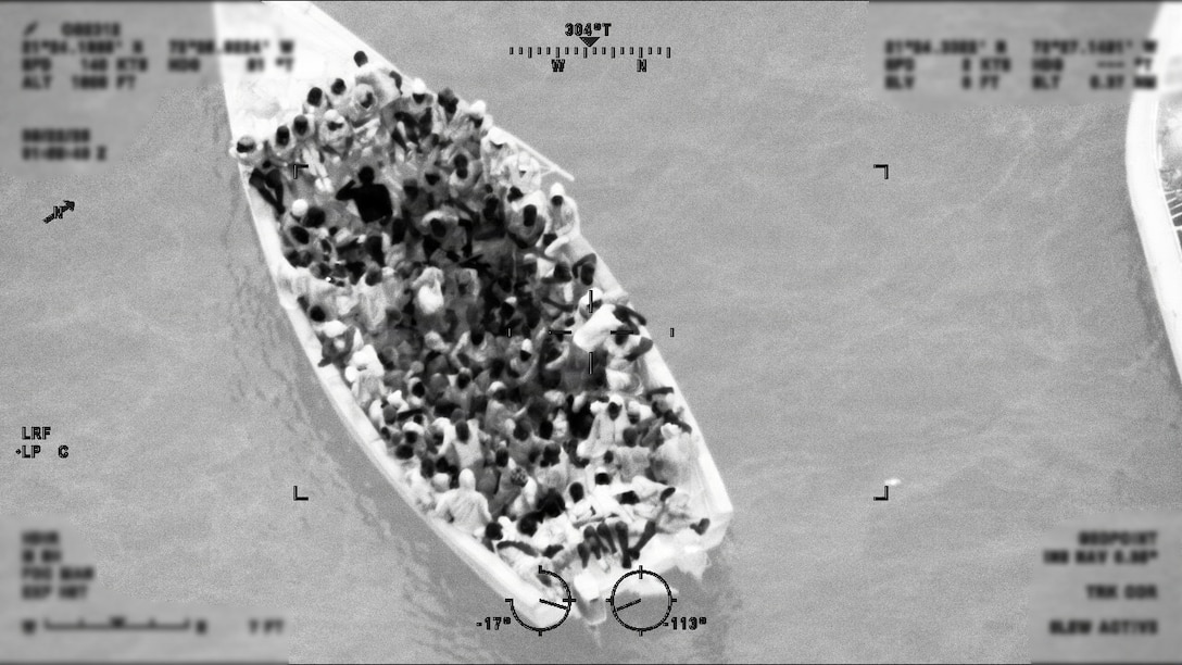 A overloaded Haitian sailing vessel underway approximately 40 miles east of Great Inagua, The Bahamas, September 21, 2025. A forward deployed U.S. Coast Guard Aviation Training Center HC-144 Ocean Sentry aircrew spotted the vessel during a routine surveillance flight along the Florida Straits. (U.S. Coast Guard photo)