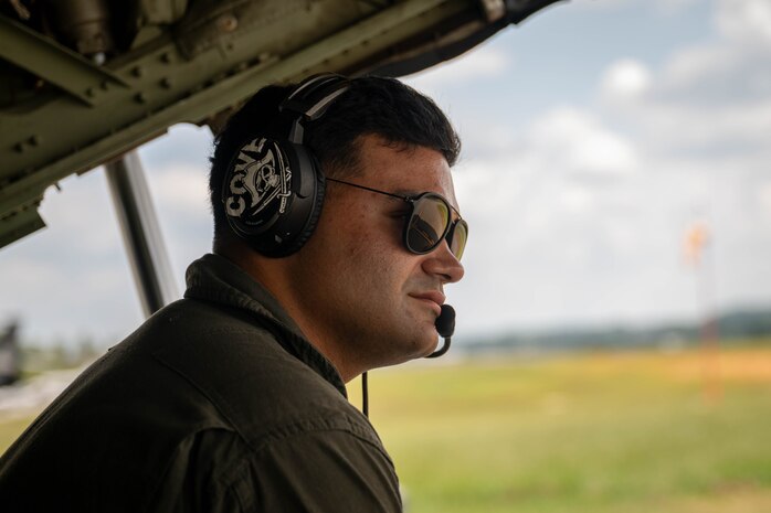 U.S. Marine Corps Sgt. Rafael Morales Maldonado, a fixed-wing aircraft loadmaster with 2nd Marine Aircraft Wing assigned to Special Purpose Marine Air-Ground Task Force 250, sits in the back of a C-130 Hercules aircraft at Cobb County International Airport, Kennesaw, Georgia, during Marine Week Atlanta, Aug. 31, 2025. Marines stationed across the globe commemorate the 250th anniversary of the Marine Corps, honoring a distinguished legacy of service, sacrifice, and unwavering fidelity to both the nation and the Corps. (U.S. Marine Corps photo by Sgt. Alexis French)