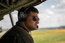 U.S. Marine Corps Sgt. Rafael Morales Maldonado, a fixed-wing aircraft loadmaster with 2nd Marine Aircraft Wing assigned to Special Purpose Marine Air-Ground Task Force 250, sits in the back of a C-130 Hercules aircraft at Cobb County International Airport, Kennesaw, Georgia, during Marine Week Atlanta, Aug. 31, 2025. Marines stationed across the globe commemorate the 250th anniversary of the Marine Corps, honoring a distinguished legacy of service, sacrifice, and unwavering fidelity to both the nation and the Corps. (U.S. Marine Corps photo by Sgt. Alexis French)