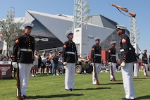 U.S. Marines with the United States Marine Corps Silent Drill Platoon execute their "rifle inspection" sequence during a performance at the College Football Aflac Kickoff show during Marine Week Atlanta in Atlanta, Ga., Aug. 31, 2025. The year 2025 marks the 250th anniversary of the United States Marine Corps, a milestone that highlights the legacy, transformation and enduring spirit of the Corps since 1775. Throughout the year, Marines across the globe will commemorate this anniversary by honoring the service and sacrifice of those who served before them and by remaining faithful to the motto Semper Fidelis. (U.S. Marine Corps photo by Cpl. Christopher Prelle)