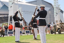 U.S. Marines with the United States Marine Corps Silent Drill Platoon execute their "double inspection" sequence during a performance at the College Football Aflac Kickoff show during Marine Week Atlanta in Atlanta, Ga., Aug. 31, 2025. The year 2025 marks the 250th anniversary of the United States Marine Corps, a milestone that highlights the legacy, transformation and enduring spirit of the Corps since 1775. Throughout the year, Marines across the globe will commemorate this anniversary by honoring the service and sacrifice of those who served before them and by remaining faithful to the motto Semper Fidelis. (U.S. Marine Corps photo by Cpl. Christopher Prelle)