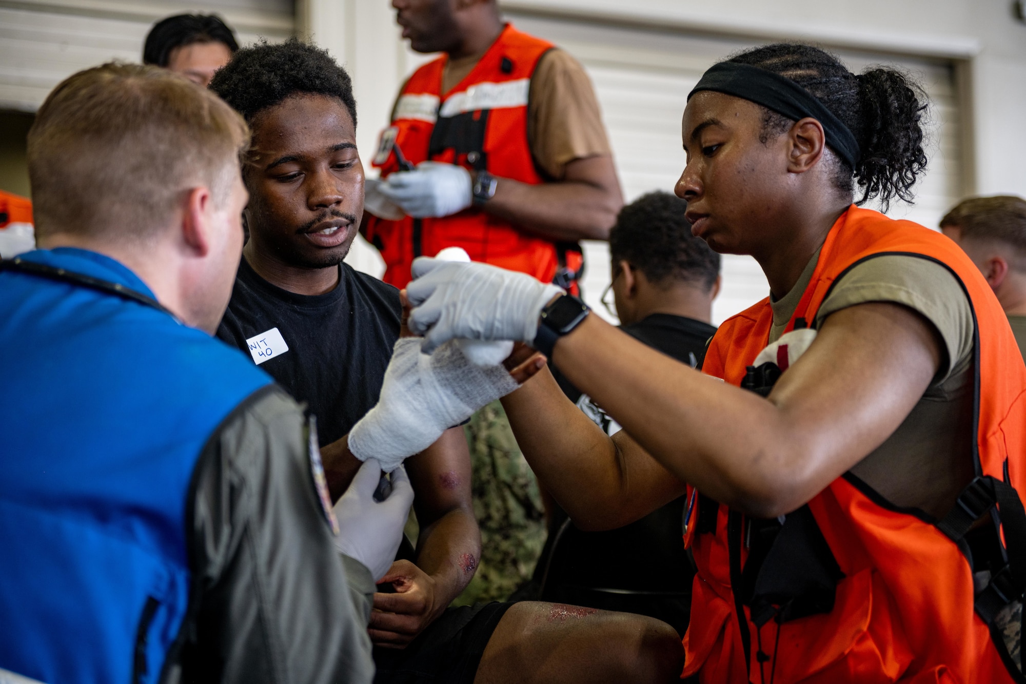 U.S. Air Force Airmen assigned to the 35th Medical Group perform triage on simulated patients during an aircraft mass casualty exercise.
