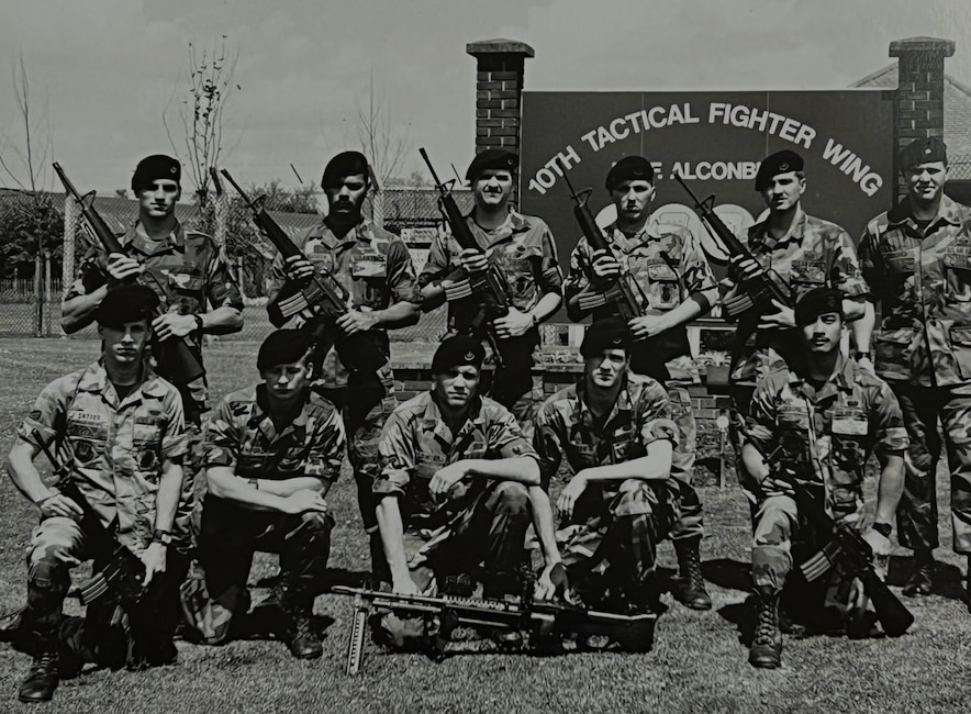 Lyndon Deboma (bottom right), chief of information protection for the 194th Wing, poses for a photo with the 1989 10th Security Police Squadron’s ‘Peacekeeper Challenge’ team on RAF Alconbury, U.K. Deboma’s team placed first in the tactics event known as the ‘Defender Challenge.’ (Courtesy photo)