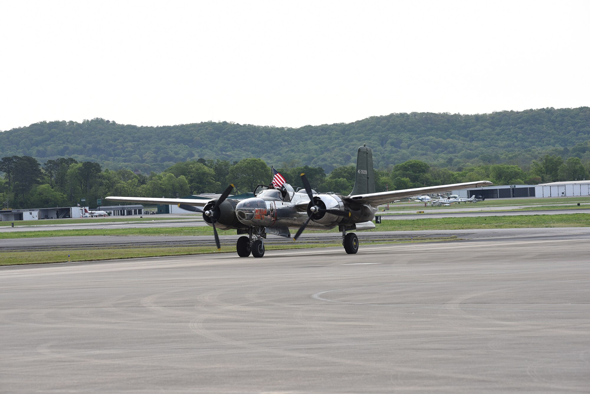 An A-26 Invader, the “Million Airess,” taxis onto the ramp April 15, 2025, at Sumpter Smith Joint National Guard Base, Birmingham, Alabama, as part of the 117th Air Refueling Wing and Southern Museum of Flight’s Bay of Pigs Invasion Commemoration. This years’ service marks the 64th anniversary of the Bay of Pigs mission that took the lives of four Alabama Air National Guard aviators – Leo Baker, Wade Gray, Pete Ray and Riley Shamburger.