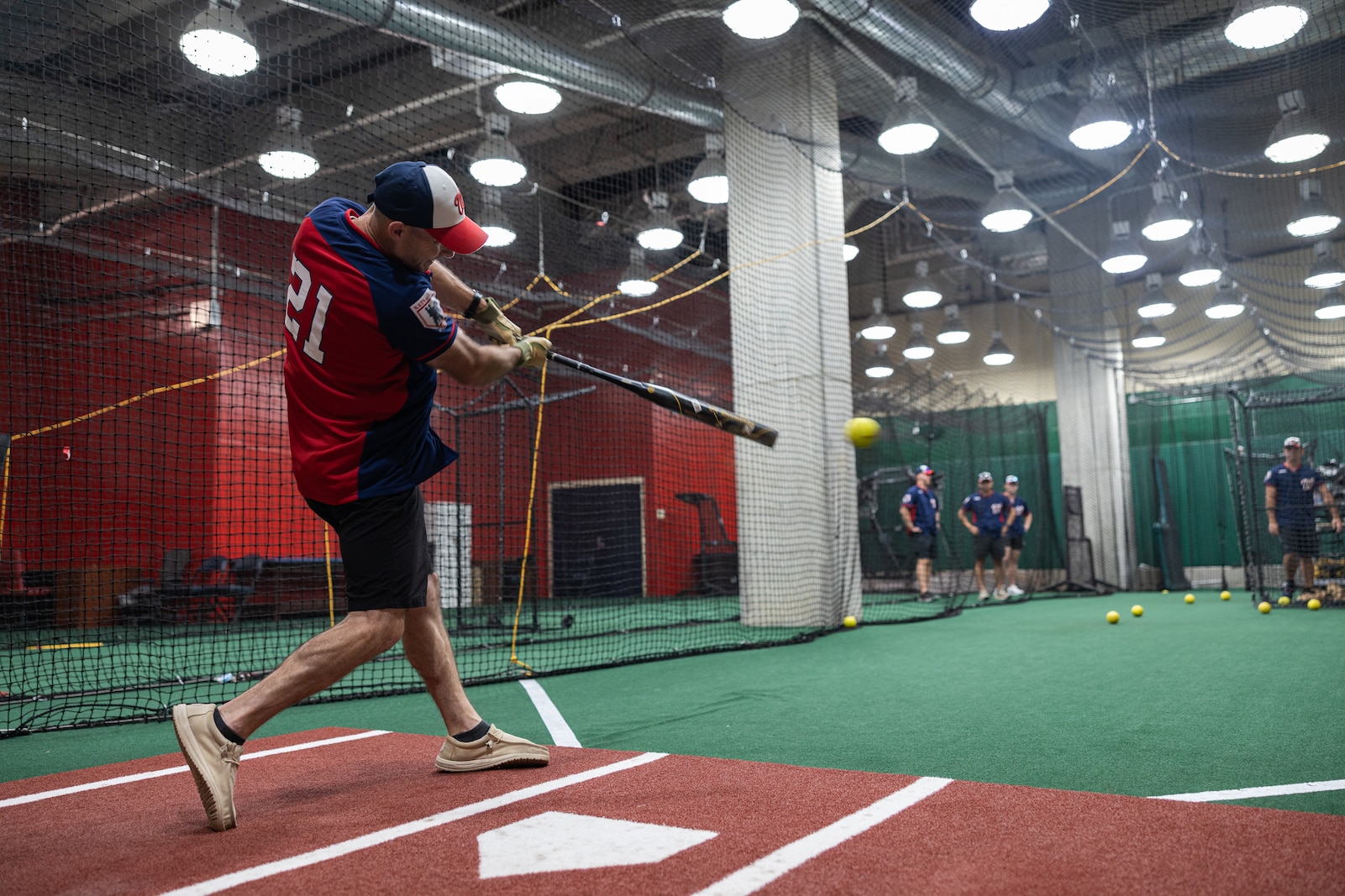 U.S. Marine Corps Lt. Col. Nathan Harmon, a member of the Marine Corps Base Quantico softball team, practices for the Battle of the Bases 2025 championship game at Nationals Park, Washington D.C., Aug. 26, 2025. Battle of the Bases is a military softball tournament, presented by the Washington Nationals, that serves as an extension of the intramural season at each of the military bases in the National Capital Region. (U.S. Marine Corps photo by Sgt. Dean Gurule)