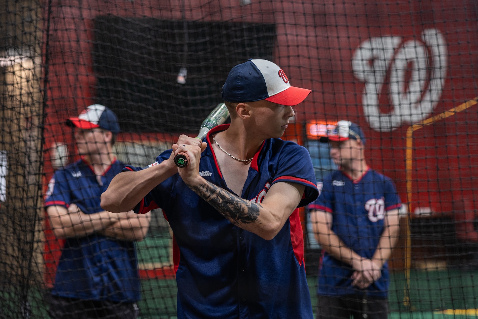 U.S. Marine Corps Cpl. Hayden McMurtry, a member of the Marine Corps Base Quantico softball team, practices for the Battle of the Bases 2025 championship game at Nationals Park, Washington D.C., Aug. 26, 2025. Battle of the Bases is a military softball tournament, presented by the Washington Nationals, that serves as an extension of the intramural season at each of the military bases in the National Capital Region. (U.S. Marine Corps photo by Sgt. Dean Gurule)