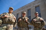 (From right) U.S. Army Sgt. Jay Whited, Spc. Elias Figueroa, and Cpl. Cynthia Fowler, assigned to the 372nd Military Police Battalion, District of Columbia Army National Guard Soldiers, stand together outside of the D.C. National Guard Headquarters in Washington, D.C. Aug 23, 2025. The team helped provide life-saving aid to a local resident while on a joint patrol with the Amtrack Police Department Aug. 15. About 2,000 National Guard members are supporting the D.C. Safe and Beautiful Task Force and are providing critical support to the D.C. Metropolitan Police Department to help ensure the safety of all who live, work and visit the District.