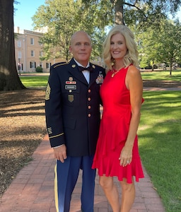 U.S. Army Sgt. Maj. Michael Binninger, operations Sgt. Maj., 117th Engineer Brigade, South Carolina Army National Guard, and wife, Susan Binninger, pose for a picture, Columbia, South Carolina, 2022.