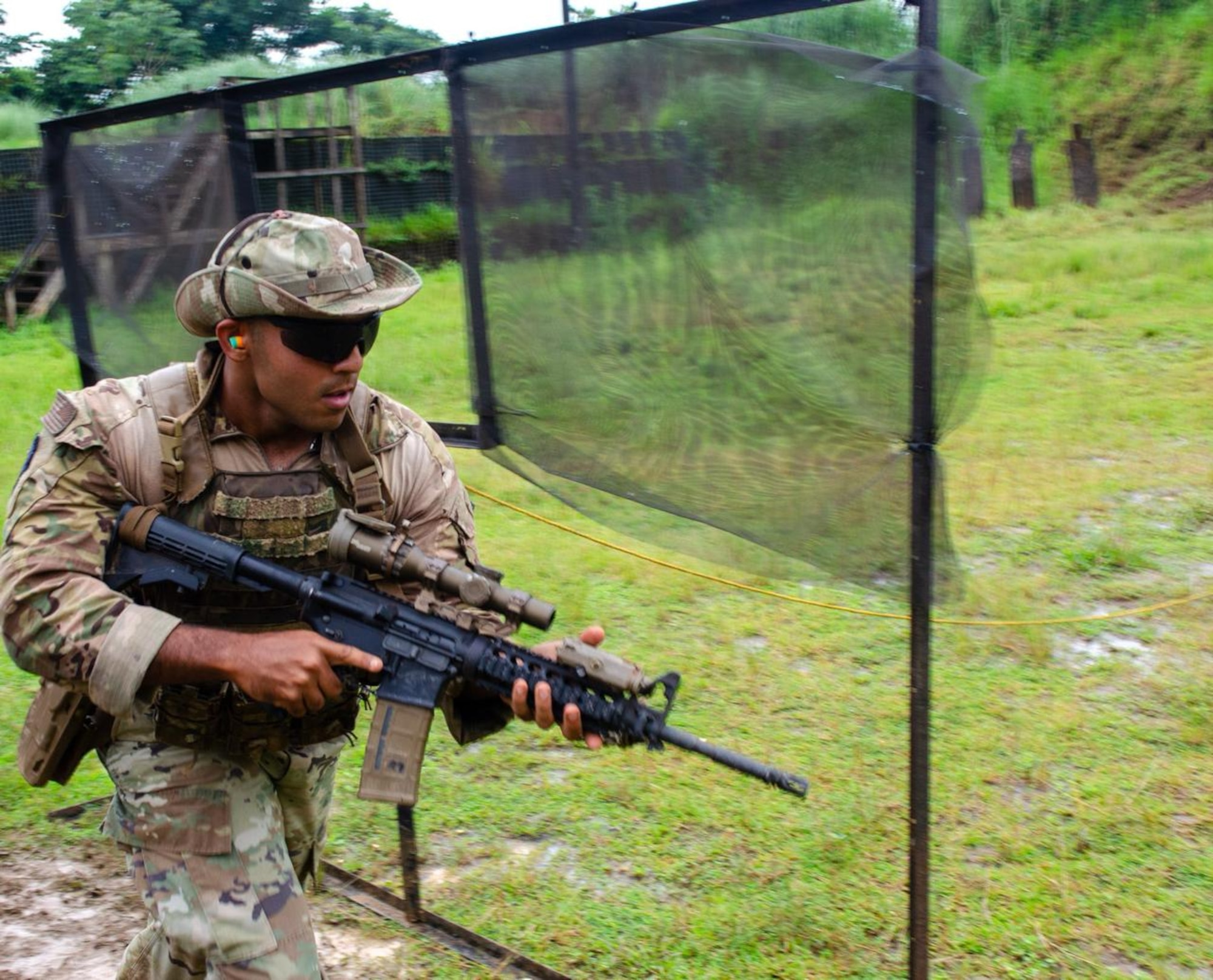U.S. Air Force Airman 1st Class Daniel Suren-Torres, a security forces Airman assigned to the 822d Base Defense Squadron, Moody Air Force Base, Georgia, conducts a training drill at a Cerro Tigre range in Panama, 2025. U.S. Southern Command is focused on increasing partner nation capacity and interoperability in the region and reflects the United States’ enduring promise of friendship, partnership, and solidarity with the Panamanian people. (U.S. Air Force courtesy photo by Staff Sgt. Sean Williams)