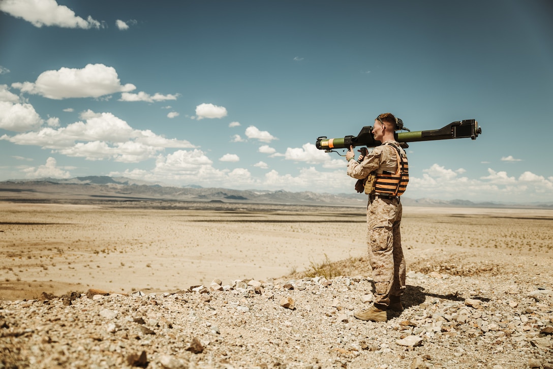 U.S. Marine Corps 1st Lt. Joseph Admiraal, a Nebraska native, low altitude air defense officer with Tactical Training and Exercise Control Group, Marine Air Ground Task Force Training Command, Marine Corps Air Ground Combat Center, uses a Man-Portable Aircraft Survivability Trainer during a Ground Threat Reaction Exercise as part of Service Level Training Exercise 4-25 at Training Area Lead Mountain, MCAGCC, Twentynine Palms, California, July 18, 2025. The GTR equips Marines with the skills to identify, respond to, and neutralize ground-based threats in dynamic environments to enhance operational readiness, in the face of evolving dangers. (U.S. Marine Corps photo by Lance Cpl. Micah Thompson)