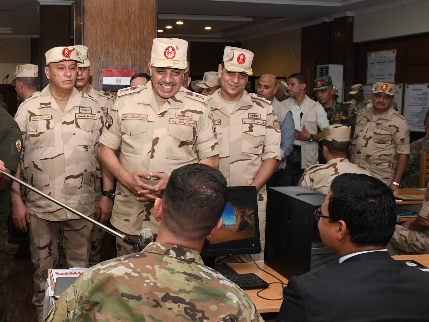 Lt. Gen. Ahmed Khalifa, Chief of Staff of the Egyptian Armed Forces, exchanges conversation with military personnel from U.S. military personnel participating in the BRIGHT STAR 25 Exercise at Mohamed Naguib Military Base, Aug. 26, 2025. BRIGHT STAR 25 enhances joint readiness and reinforces partner nations’ ability to integrate seamlessly in complex operational environments. By aligning tactics, techniques and procedures, U.S. and partner forces increase their capacity to deter aggression, improving lethality, confidence, and cohesion among multinational service members. (Courtesy photo Department of Morale Affairs, Egyptian Armed Forces – Caption writer, U.S. Central Command Maged Benjamin-Elias)