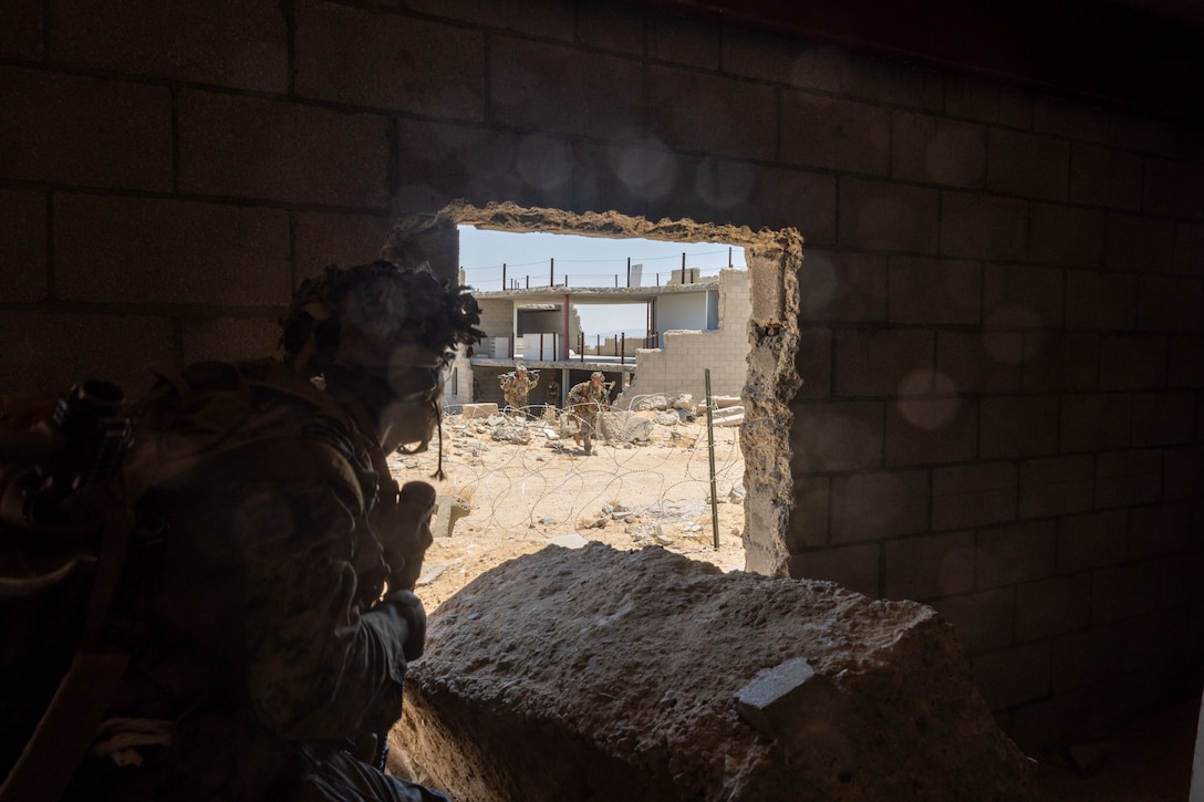 U.S. Marines with 2nd Battalion, 5th Marine Regiment, 1st Marine Division, provide security during an Adversary Force Exercise at Marine Corps Air Ground Combat Center, Twentynine Palms, California, August 8, 2025.  AFX creates a credible, realistic threat for the exercise forces participating in Service Level Training Exercise 4-25 to engage against during the upcoming Marine Air Ground Task Force Warfighting Exercise in a force-on-force, unscripted wargame. (U.S. Marine Corps photo by Lance Cpl. Jozef P. Majewski)